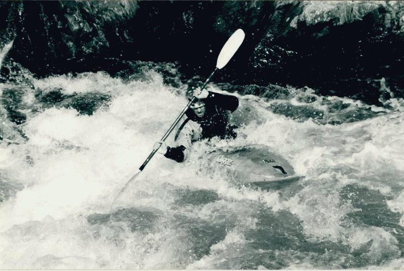 Martyn Church paddling whitewater, black and white film